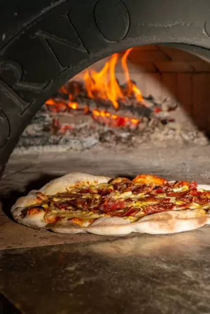 Noite da Pizza na Pousada Estaleiro Guest House, uma experiência gastronômica encantadora